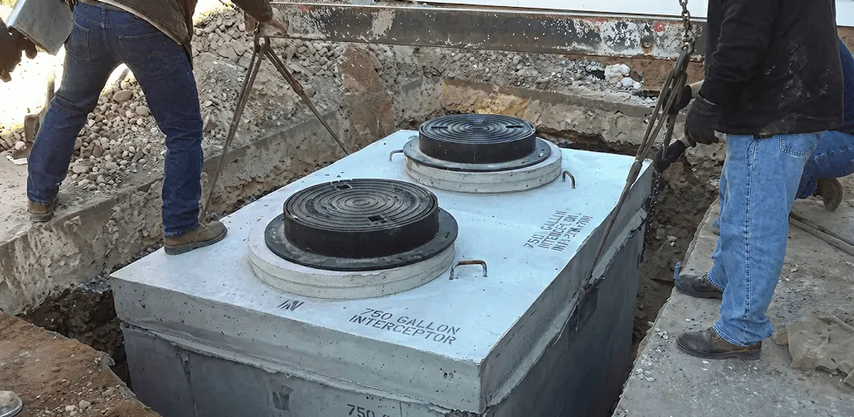 Grease trap installation for a commercial property drainage system in Tampa, FL