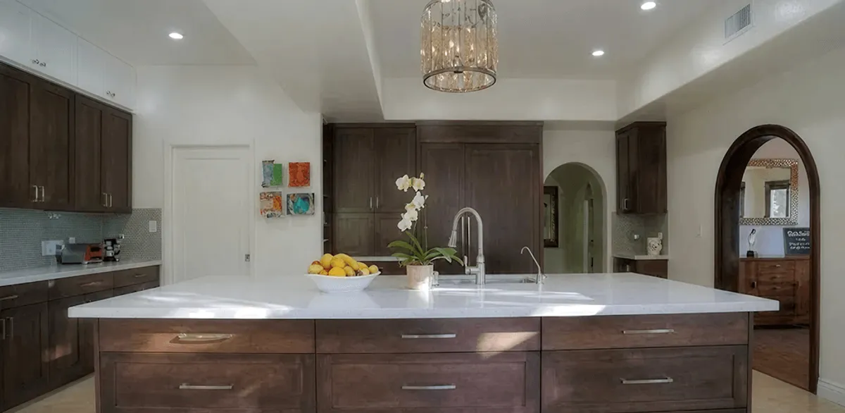 Cabinet refacing project with updated kitchen cabinets and island in Tampa, FL